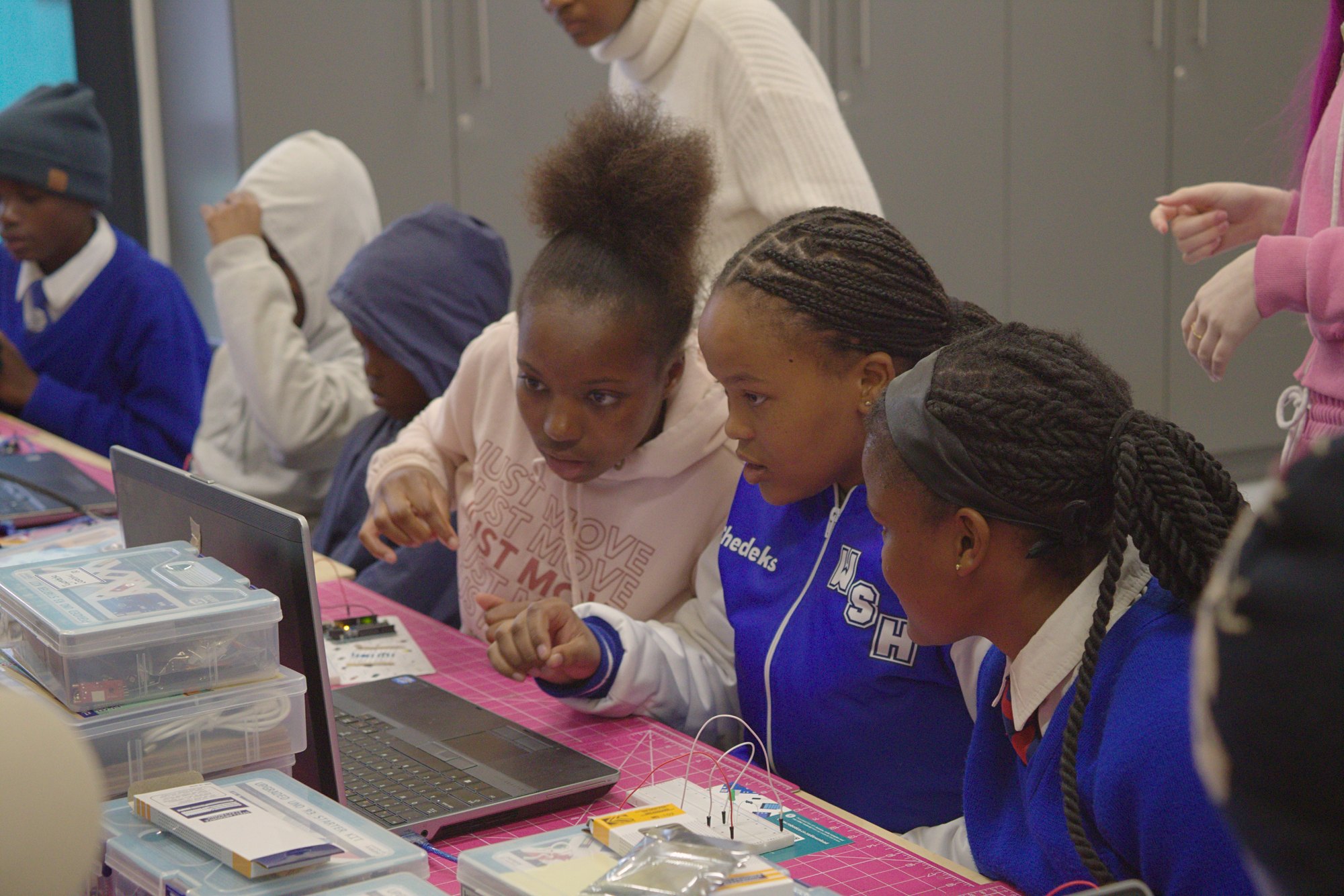 Students working with Arduino kits in a Namibian classroom